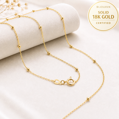 Collier boule en or massif 18 carats 750, chaîne à boules fines avec fermoir anneau ressort et badge 18K.