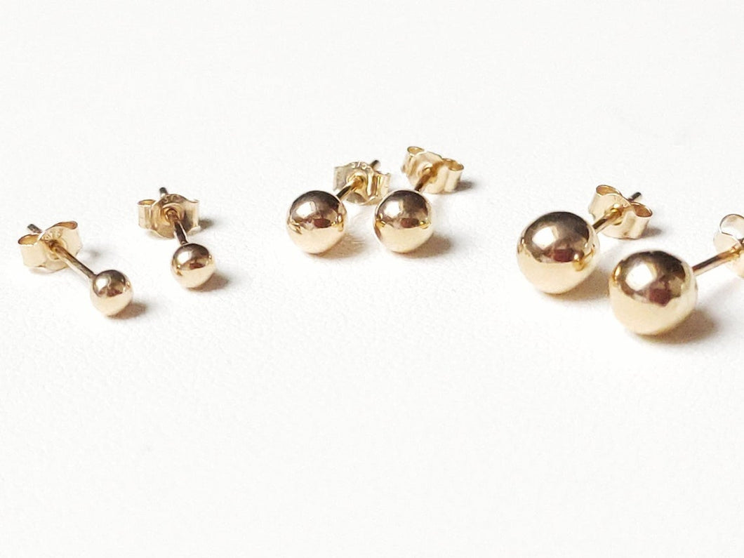 Boucles d'oreilles puces boules or jaune 18 carats 750/1000