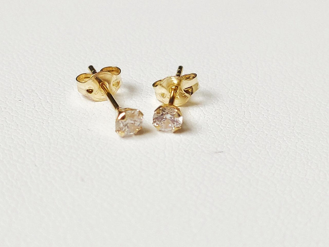 Boucles d'oreilles puces en or jaune massif 18 carats 750/1000 serties