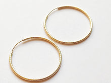 Load image into Gallery viewer, Textured effect hoop earrings in rolled gold - 14 carat gold filled
