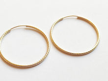 Load image into Gallery viewer, Textured effect hoop earrings in rolled gold - 14 carat gold filled
